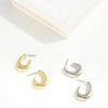 Sleek Curl Huggie Hoops